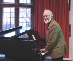 John McCabe lecturing on his brass band music, 14 December 2008. Photo © 2008 Ray Farr